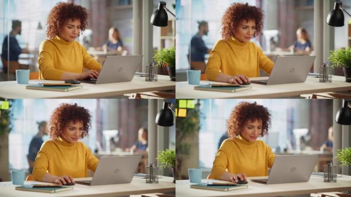 富有创造力的多民族女性在公司办公室的笔记本电脑上工作。快乐兴奋的项目经理浏览互联网，编写任务，为金融