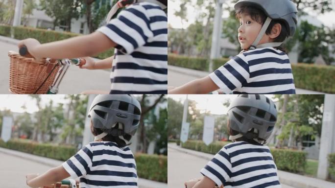 童子学着在路上骑自行车。