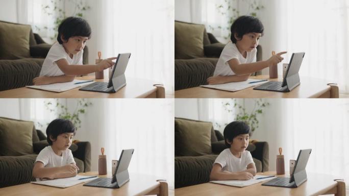 亚洲男孩在家学习视频通话