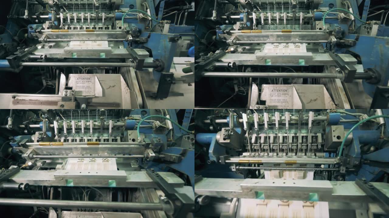 工厂机器正在运输和加工印刷纸