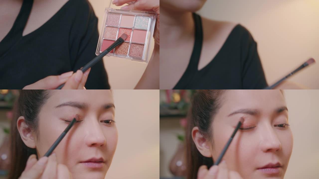 特写: 亚洲女性化妆影响者使用眼影教程录制化妆技巧病毒内容