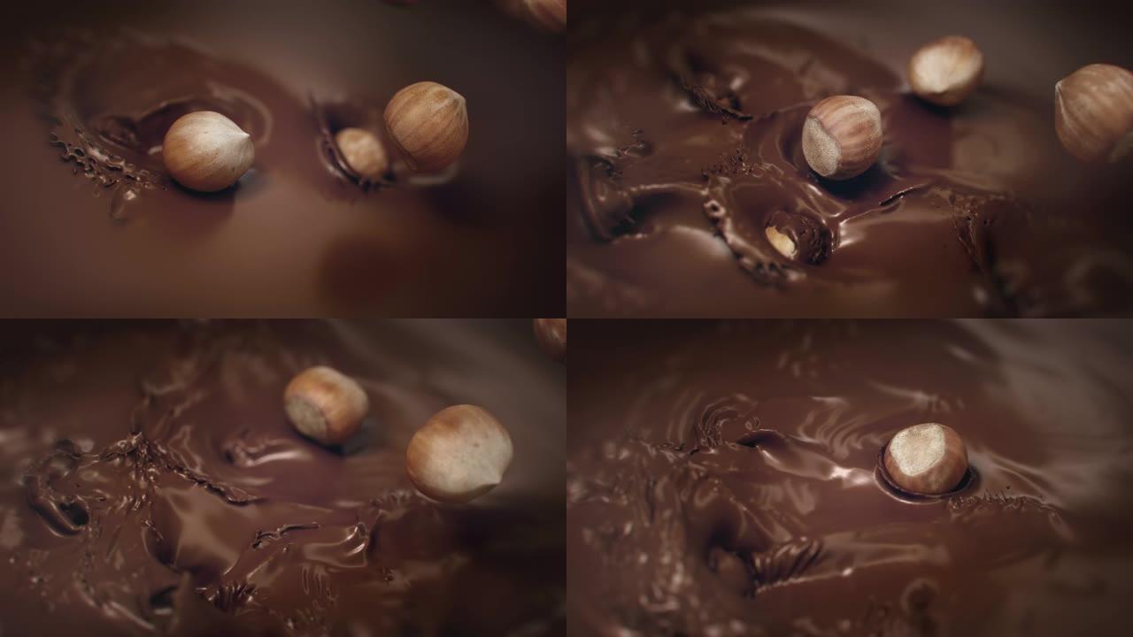 榛子在4k超慢动作中落入液体巧克力中