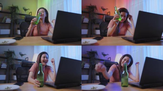 快乐迷人的女人视频通话虚拟节日派对与笔记本电脑上的朋友