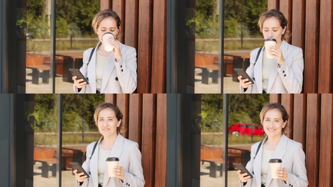户外咖啡和智能手机的年轻商务女士肖像