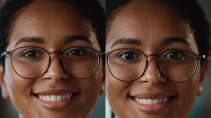 在创意办公环境中，年轻的拉丁裔短发和眼镜的垂直格式肖像视频为相机摆姿势。美丽多样的多种族西班牙裔女性