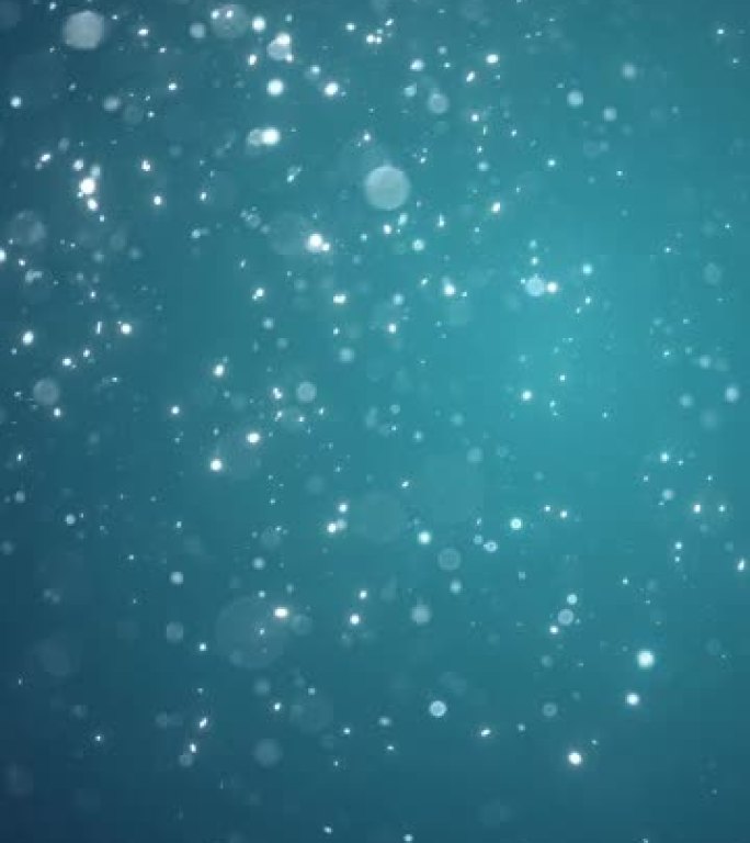 闪闪发光的粒子像雪一样落下-圣诞节背景