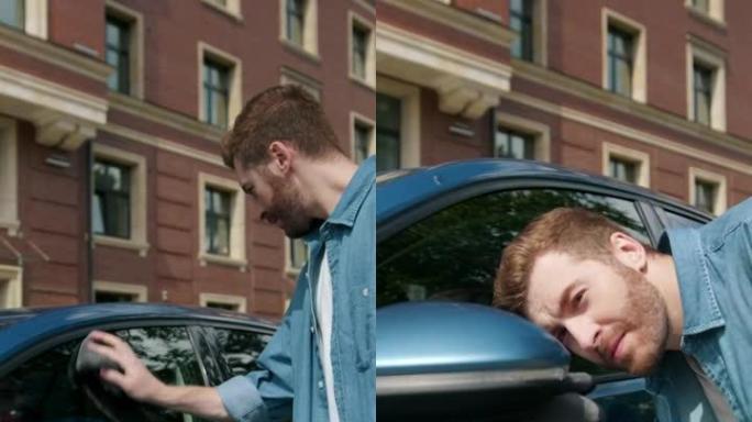 一位穿着牛仔裤衬衫的迷人红发汽车司机正在清洁车窗和后视镜