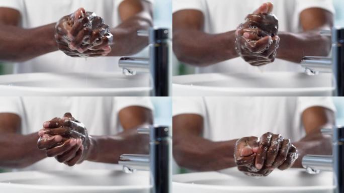 4k视频片段，一个无法辨认的男人在浴室洗手，这是他早上例行公事的一部分