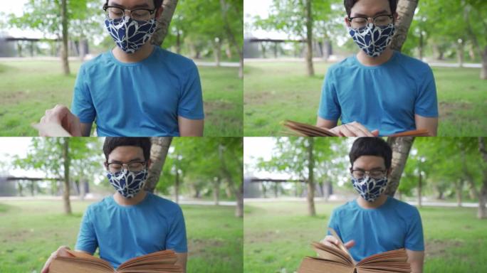 亚洲男子戴着防护口罩在公园看书新型冠状病毒肺炎日冕病毒情况在多莉shota