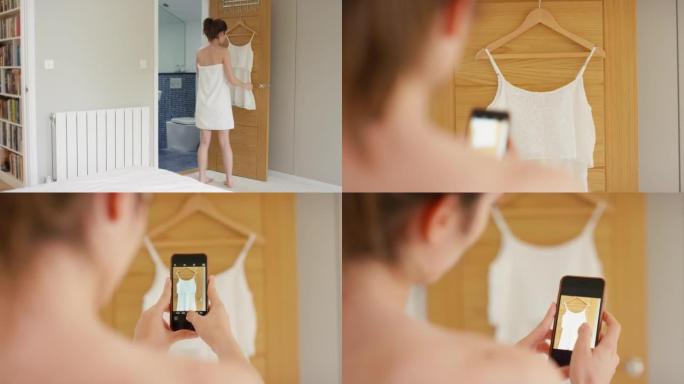 4k视频片段，一名年轻女子使用智能手机拍摄自己的服装选择照片