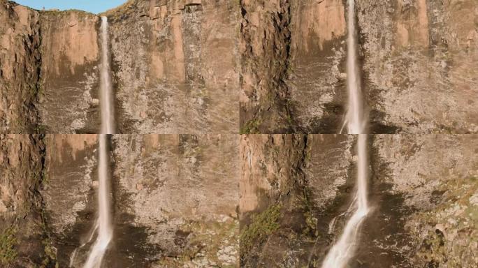 壮观的鸟瞰图观光者站立并欣赏壮丽的美丽的图格拉瀑布，世界第二高的瀑布，南非夸祖鲁-纳塔的德拉肯斯堡