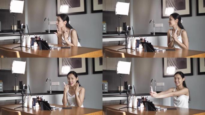 年轻美丽的亚洲女性和专业美容化妆师vlogger