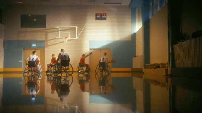 轮椅篮球比赛场地: 球员比赛，运球，成功射门，得分得分。残疾人的决心、技能。精力充沛的快节奏宽镜头