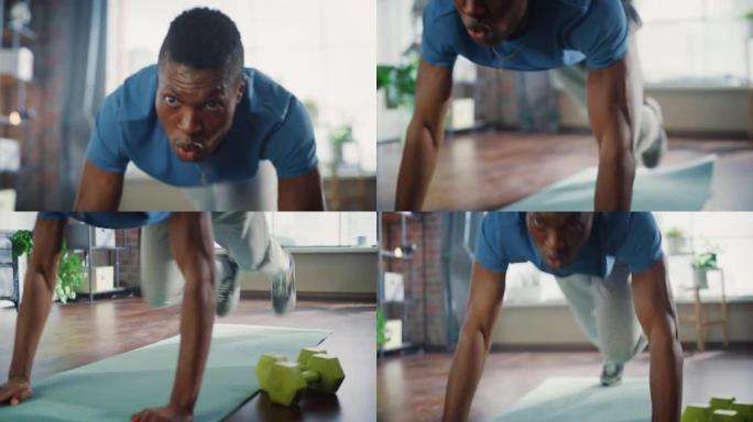 强壮集中的黑人在家里晨练时做有氧高膝盖和核心强化运动。健康的生活方式、健身和娱乐理念。移动摄像机拍摄