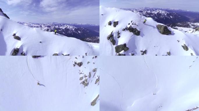 空中: 在山顶上滑雪的极端自由滑雪者
