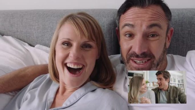幸福的夫妇在视频聊天女人上与朋友分享订婚，显示结婚戒指通过网络摄像头分享兴奋