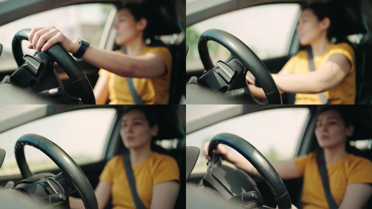 亚洲女子驾驶汽车女性驾车车内转弯