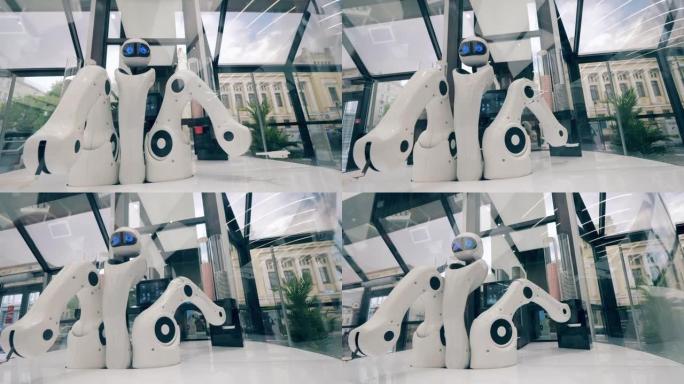 未来派机器人，创新科技理念。Droid正在拿一个纸杯，然后将其移到咖啡机中