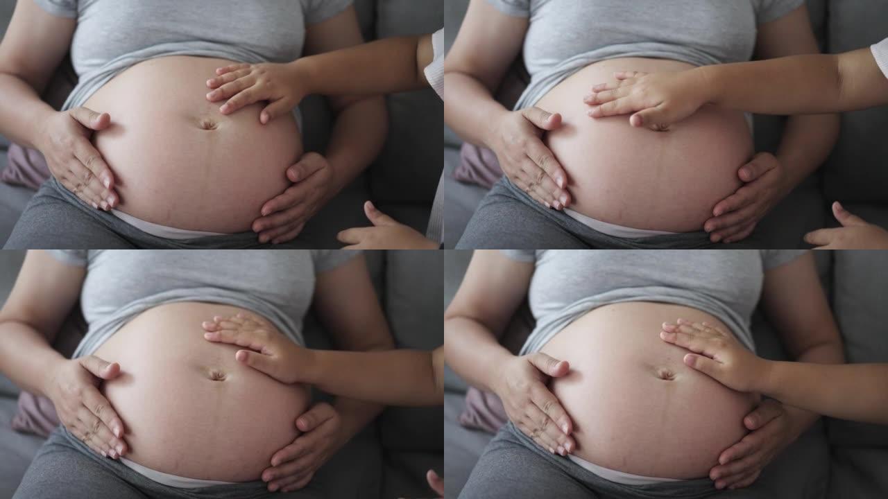 孕妇带着女儿和婴儿的子宫新生活
