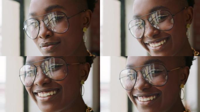 创意，办公室和黑人妇女的脸肖像站在窗前在一家初创公司。来自南非的快乐、微笑和z世代非洲创意设计师，在