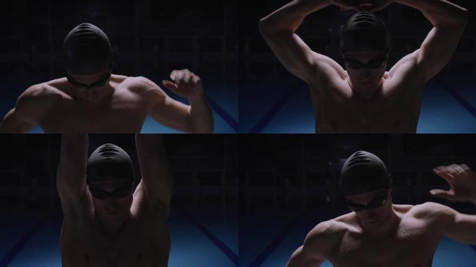 年轻的职业男游泳者带帽的电影镜头正在进行热身运动，并在游泳池训练前戴上护目镜。运动、竞争、胜利、健身