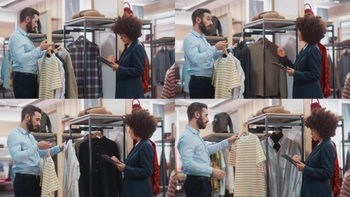 服装店: 女商人使用平板电脑，与视觉商品专家交谈，合作创建时尚的系列。小型企业时装店销售经理与设计师