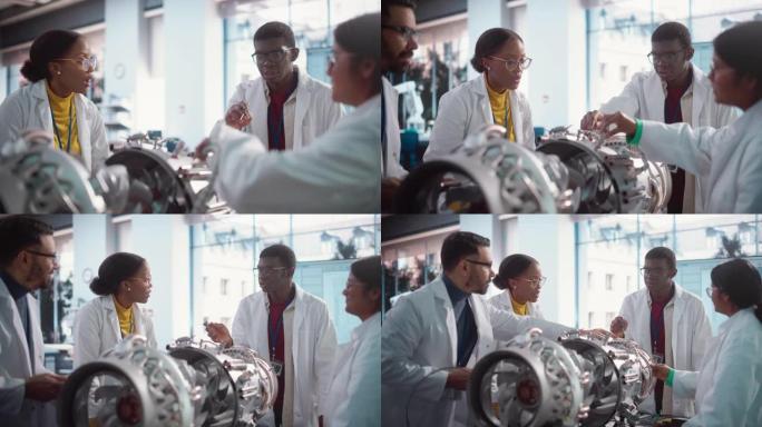 在科学技术实验室中进行讨论的工业工程师团队正在研究未来的喷气发动机。多种族的年轻科学家在研究设施中开