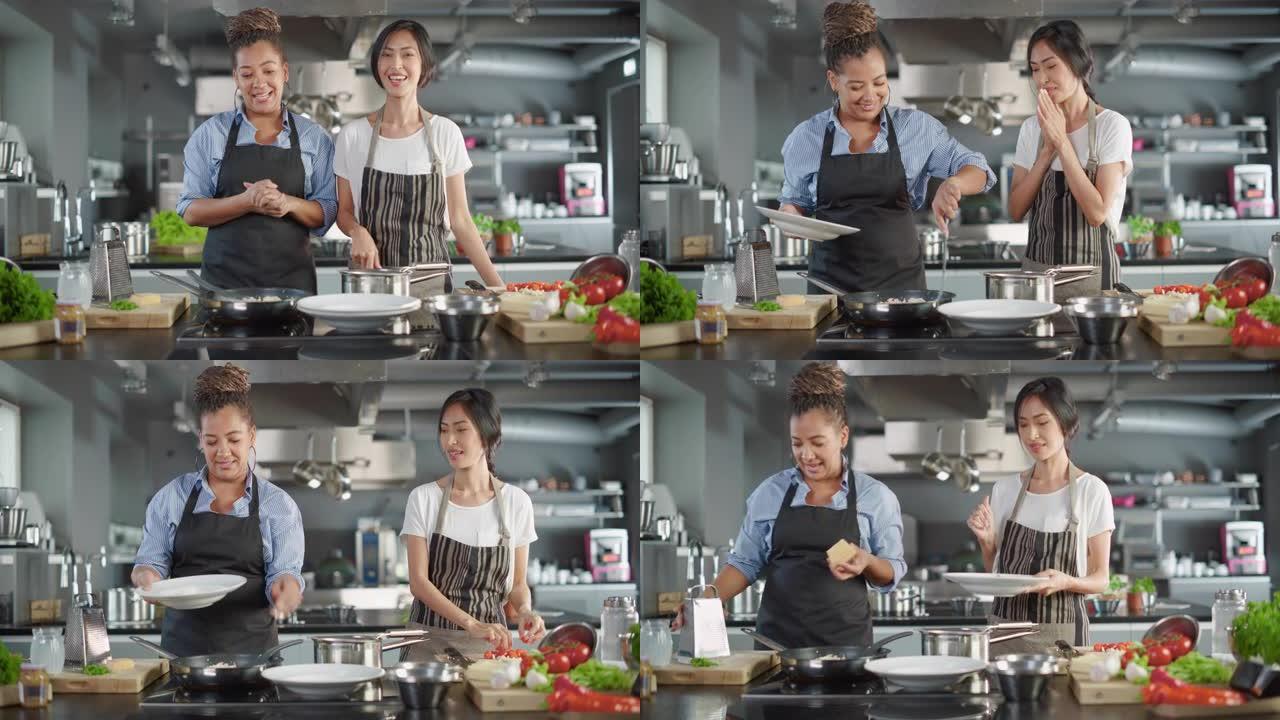 电视烹饪节目厨房有两位大厨。亚洲和黑人女性主持人交谈。专业人士教如何烹饪食物，品尝美味佳肴。在线视频