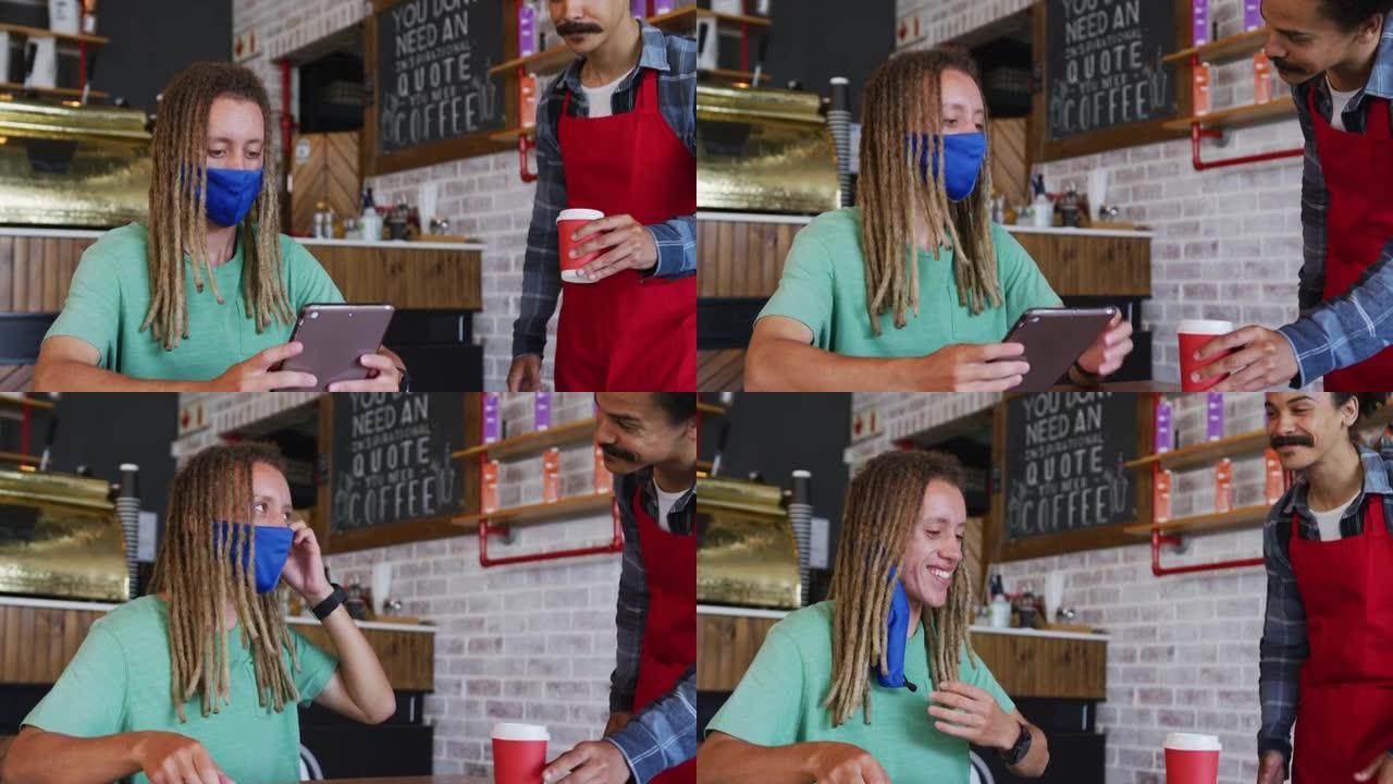 混合种族男性咖啡师与发辫服务客户咖啡