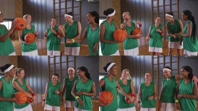 多元化女子篮球队笑拿球的肖像