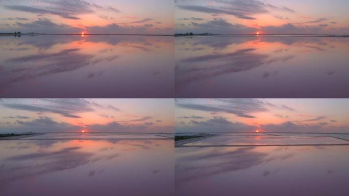 空中: 在一个阳光明媚的夏日傍晚，无人机拍摄了墨西哥宁静的盐泻湖。