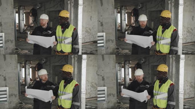 两名男子在建筑工地工作