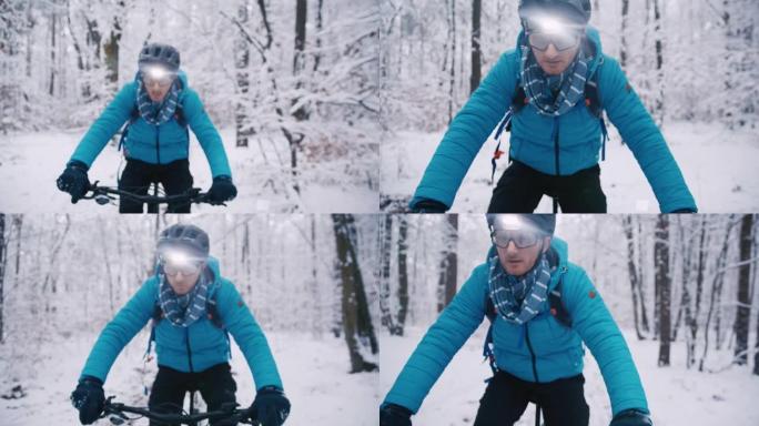 成年男子骑电动自行车冬季在一片白雪皑皑的森林