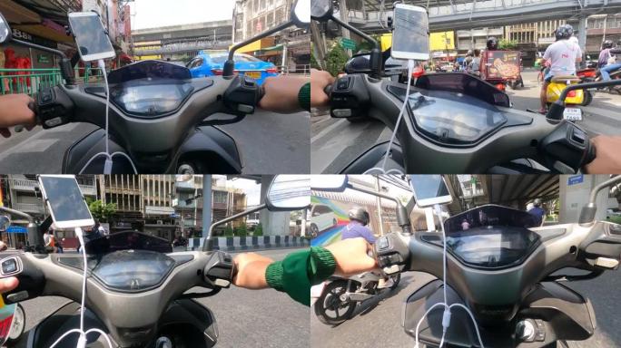 POV骑自行车的人在泰国的街上骑摩托车