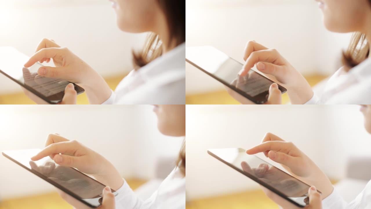 一名妇女使用数字平板电脑的4k视频片段