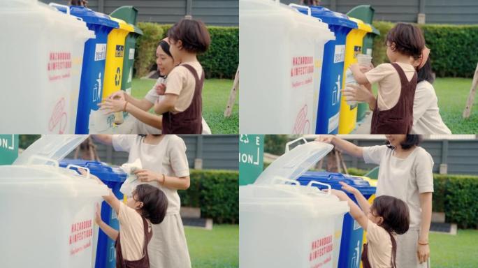 亚洲母亲教她的儿子如何回收废物。