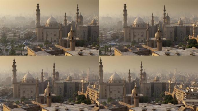 日落时分，埃及开罗苏丹哈桑清真寺的照片。在夕阳的轻雾中，开罗市。高质量4k镜头