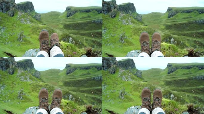 4k视频片段，一个无法识别的女人独自坐着欣赏山景