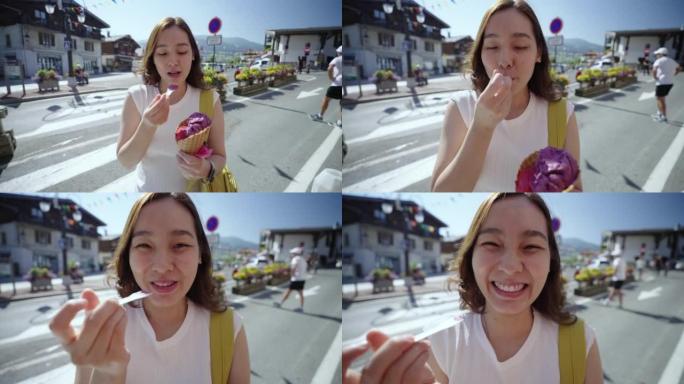 年轻女子在暑假用冰淇淋提神