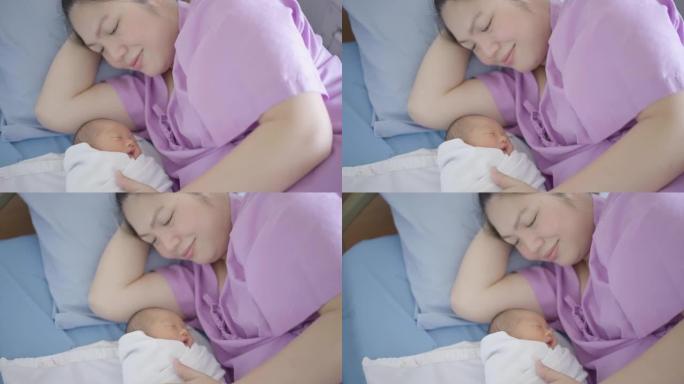 母亲带着婴儿带着爱，分娩后在医院接受治疗