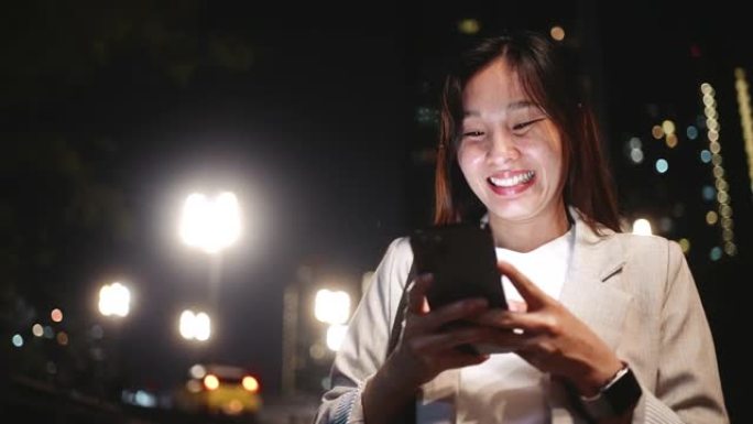 亚洲女子打字短信智能手机联网通话购物自拍