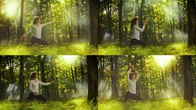 SLO MO年轻女子在阳光朦胧的绿色森林中练习瑜伽