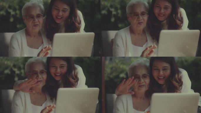 亚洲妇女和她的母亲在家里一起使用笔记本电脑