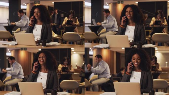 4k视频片段，一名年轻的女商人在会议室的笔记本电脑上工作时在手机上聊天