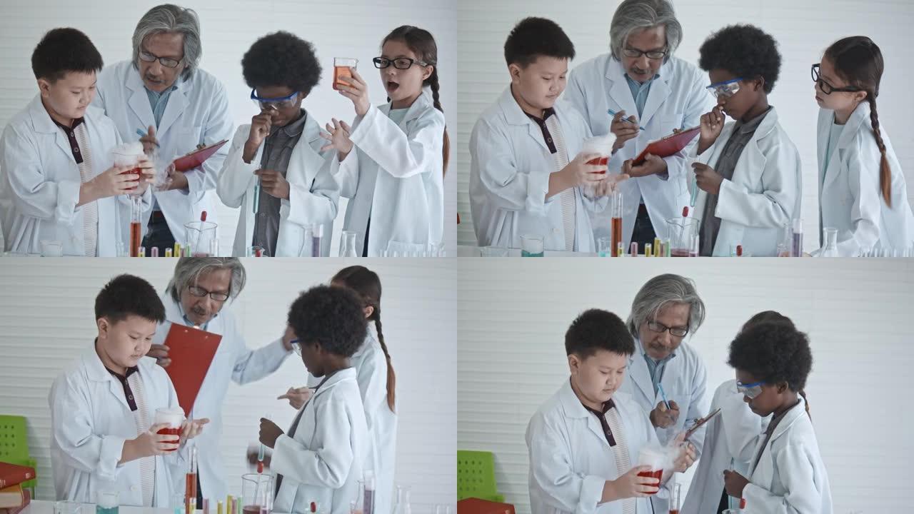 高级教师协助孩子进行科学实验