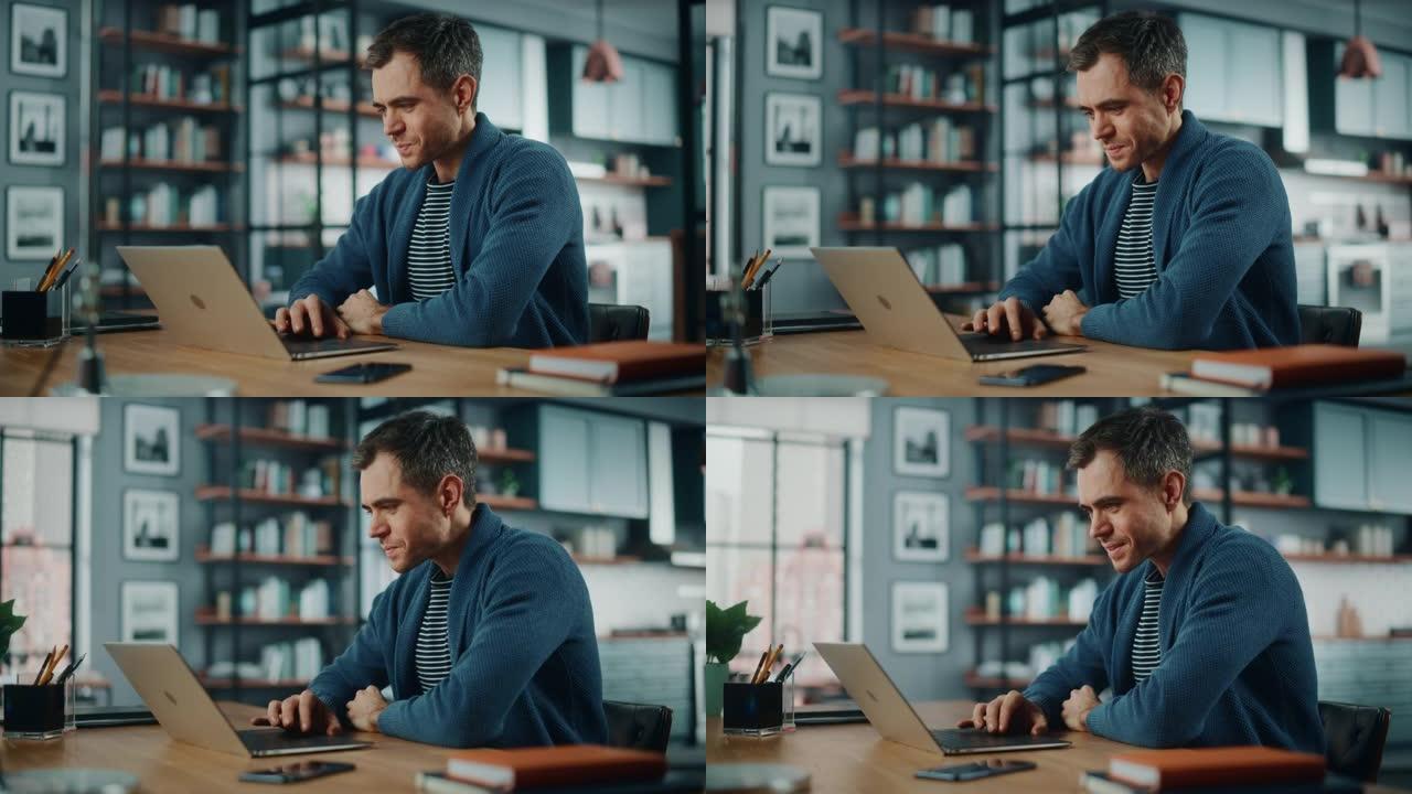 英俊的白人男子坐在舒适的客厅的桌子后面，在笔记本电脑上工作。自由职业者在家工作。浏览互联网，使用社交