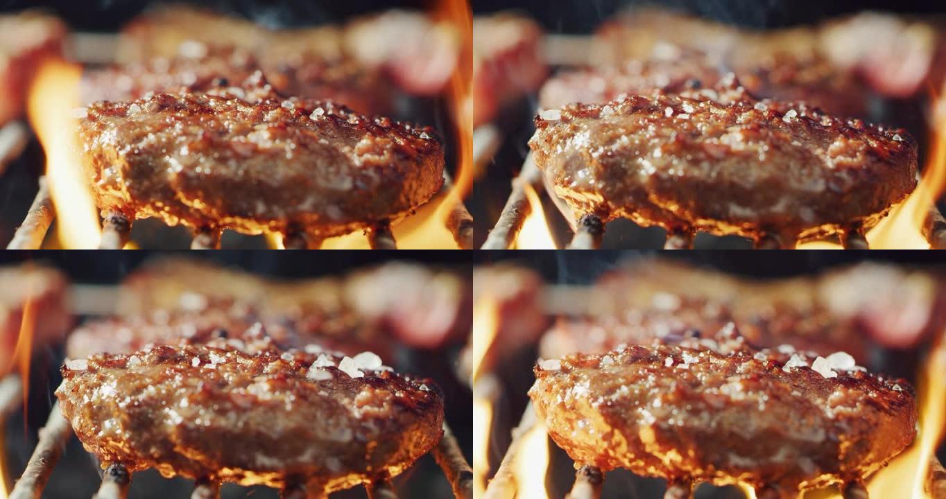 新鲜多汁的肉的宏观镜头正在烈火上烧烤。概念: 美食，朋友，节日，传统，放松