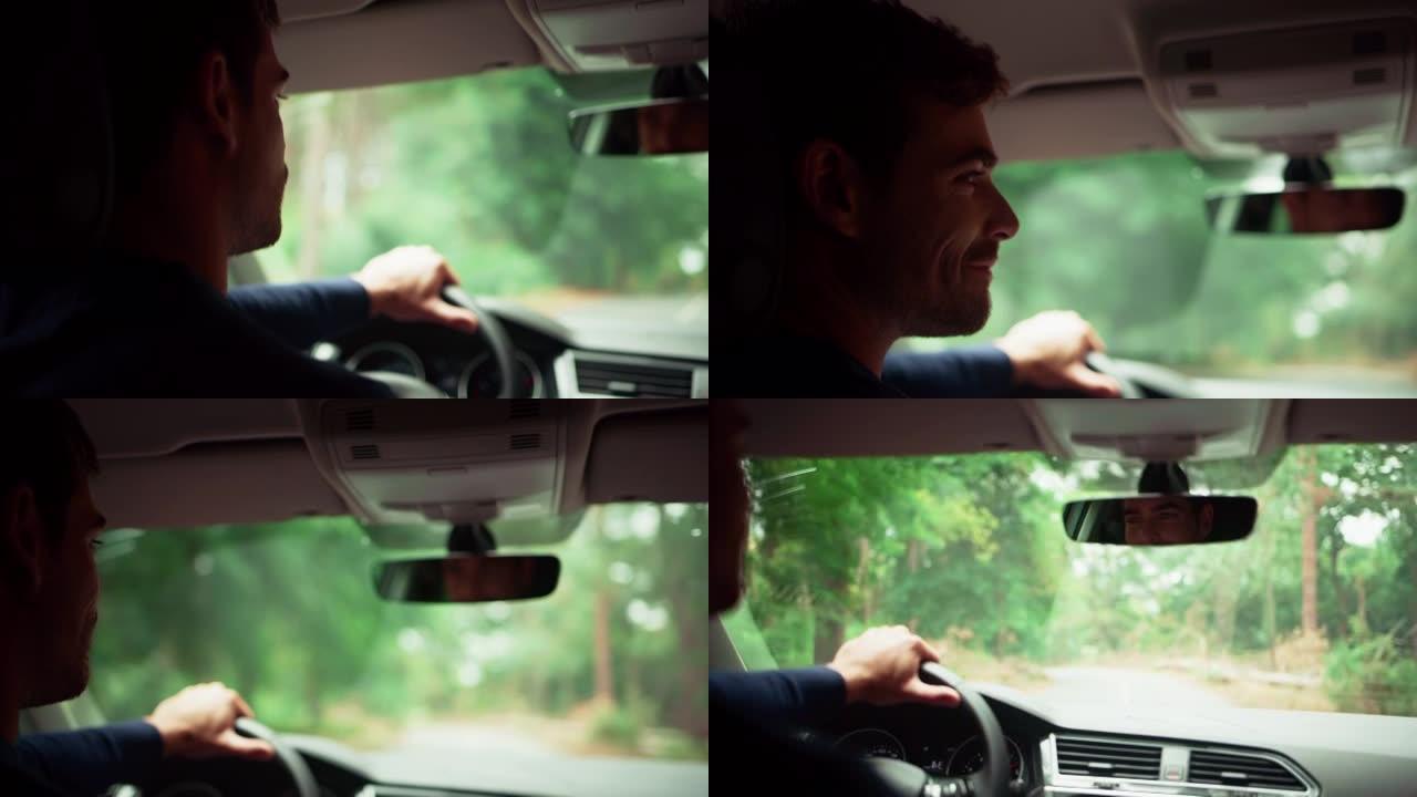 男子驾驶汽车司机开车手握方向盘轿车后排视