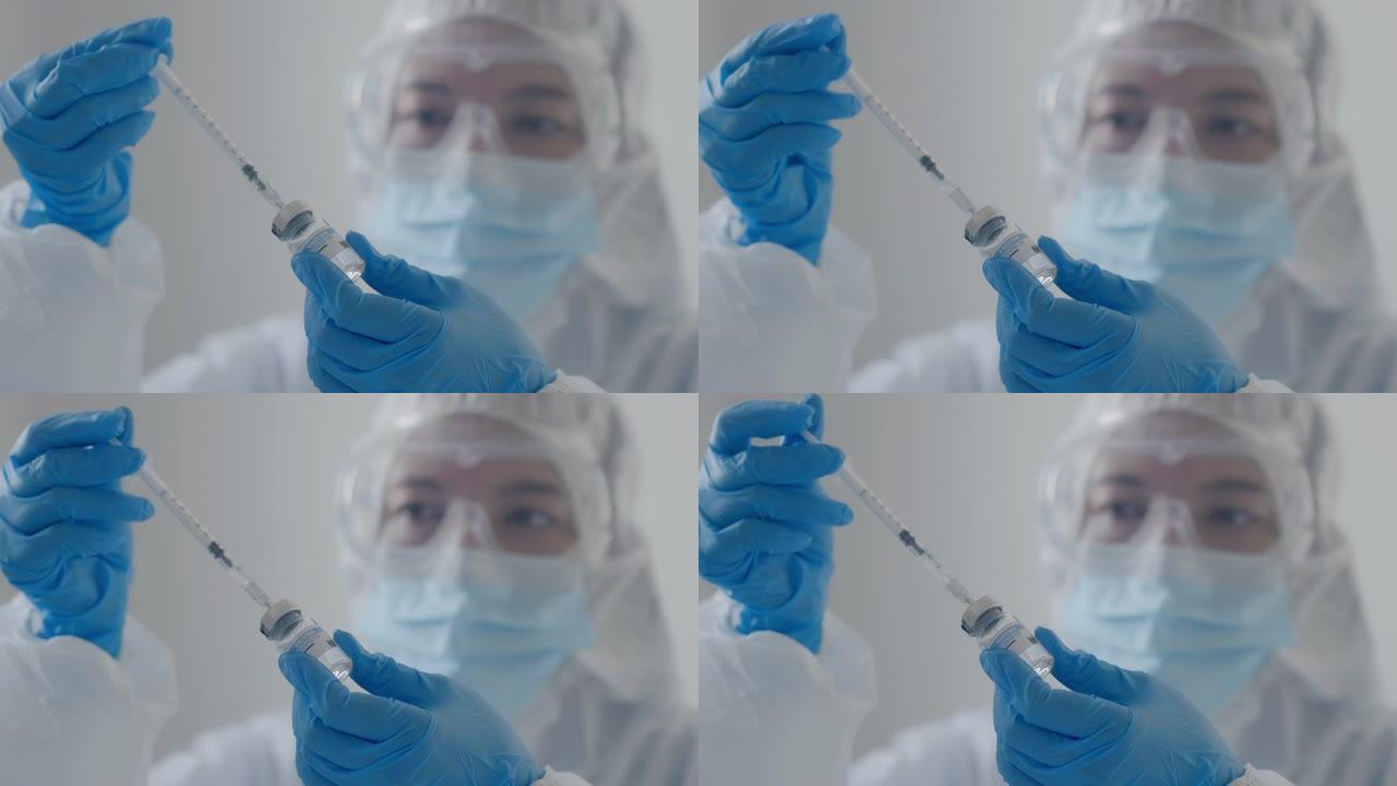 医生手中的新型冠状病毒肺炎疫苗。