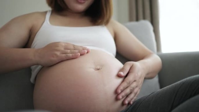 孕妇对肚子里的婴儿充满了爱意和幸福